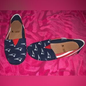 Patriot’s slip ons.